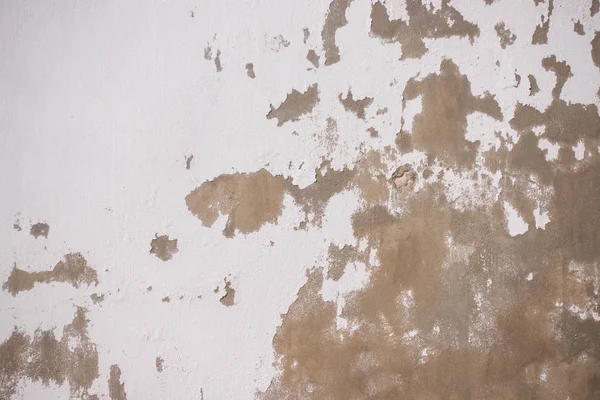 Fondo de textura de pared de yeso blanco y oscuro agrietado antiguo — Foto de Stock