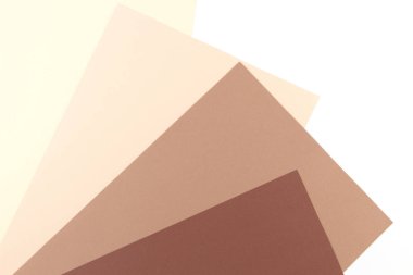 Renkli yumuşak kahverengi, bej, sarı ve beyaz kağıt arka plan.