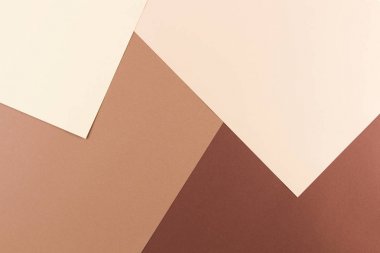 Pembe, bej ve kahverengi tonlar kağıtları geometri kompozisyon arka planını renklendirin.