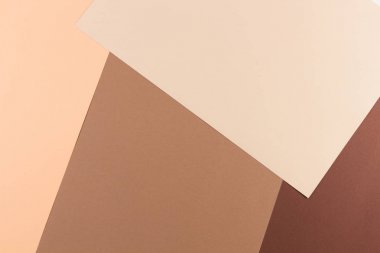 Pembe, bej ve kahverengi tonlar kağıtları geometri kompozisyon arka planını renklendirin.