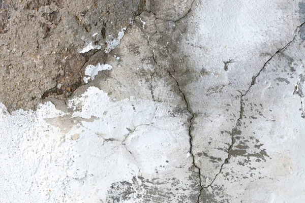 Antigua pared de yeso grunge blanco con textura de fondo de estructura agrietada — Foto de Stock