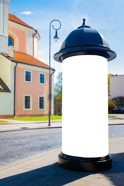 Mock up. Blank outdoor advertising column outdoors, public information board in the city. — Stock Photo, Image