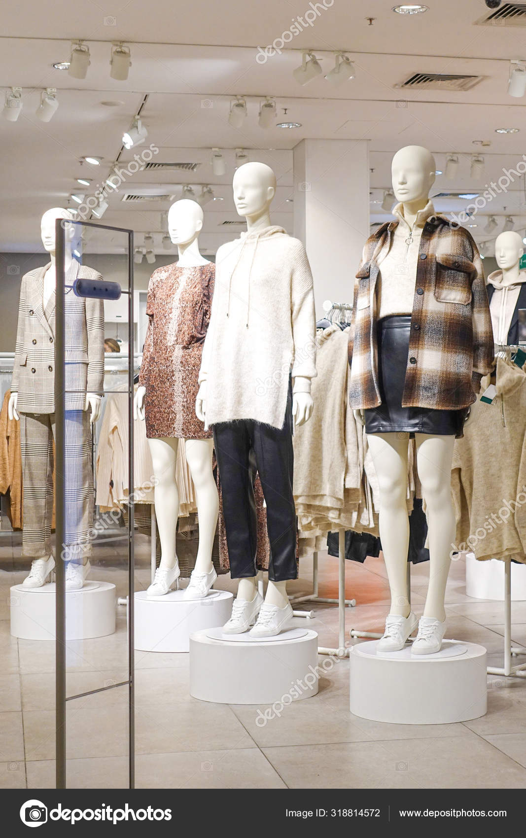 Modern fashionable brand interior of clothing store inside shopping