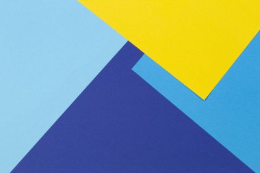 Yaratıcı soyut mavi ve sarı renkli geometrik kağıt kompoziton arkaplan, üst görünüm