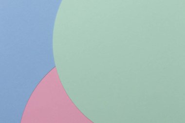 Soyut renkli kağıt dokusu arkaplanı. Pastel pembe, açık mavi ve yeşil renkte minimal geometrik şekiller ve çizgiler