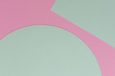 Soyut renkli kağıt dokusu arkaplanı. Minimum geometrik şekiller ve pastel pembe çizgiler, açık yeşil renkler