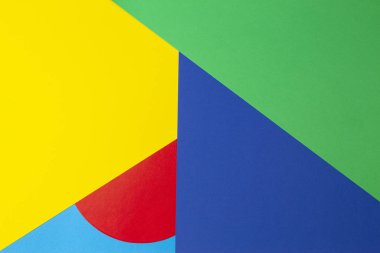 Soyut geometrik şekil sarı, mavi, kırmızı, yeşil renkli kağıt arkaplan
