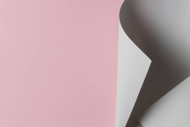 Soyut geometrik şekil gri ve açık pembe renkli kağıt arkaplan
