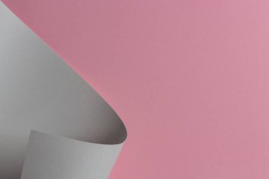 Soyut geometrik şekil gri ve açık pembe renkli kağıt arkaplan