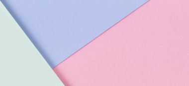 Soyut renkli kağıt dokusu arkaplanı. Pastel pembe, açık mavi ve yeşil renkte minimal geometrik şekiller ve çizgiler