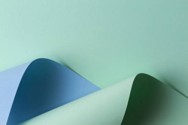 Abstract geometric shape light green and blue color paper background