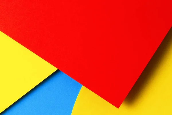 Abstrakt färgat papper textur bakgrund. Minimala geometriska former och linjer i gult, ljusblått, rött — Stockfoto