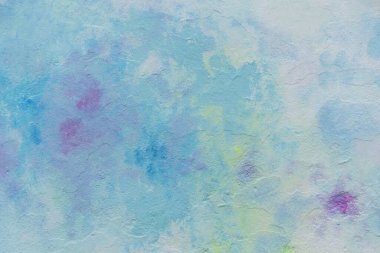 Soyut mavi, pembe, sarı ve beyaz duvar desenli arka plan.