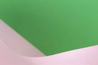 Soyut geometrik şekil pembe ve yeşil renk kağıt arka plan