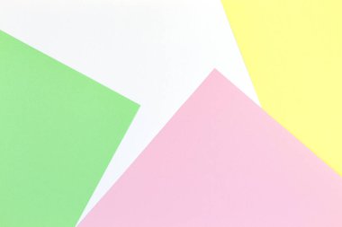 Soyut renkli kağıt dokusu arkaplanı. Pastel pembe, açık yeşil, beyaz ve sarı renkte minimum geometrik şekiller ve çizgiler