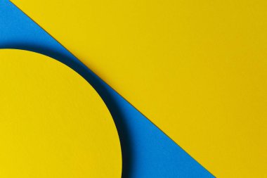 Soyut renkli kağıt dokusu arkaplanı. Açık mavi ve sarı renkli minimal geometrik şekiller ve çizgiler