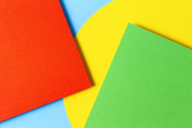 Soyut renkli kağıt dokusu arkaplanı. Asgari geometrik şekiller ve çizgiler sarı, açık mavi, kırmızı, yeşil