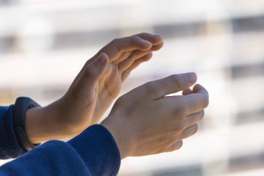 Applause to medical staff. Kid clapping hands, applauding from balcony to support doctors, nurses, hospital workers during Coronavirus pandemic quarantine clipart