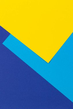 Yaratıcı soyut mavi lacivert ve sarı renkli geometrik kağıt kompoziton arkaplan, üst görünüm