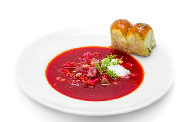 Ukrainian borsch isolated in a white plate — Stock Photo, Image