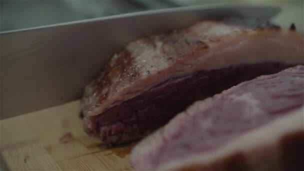 Beef tenderloin cut in slices — Stock Video