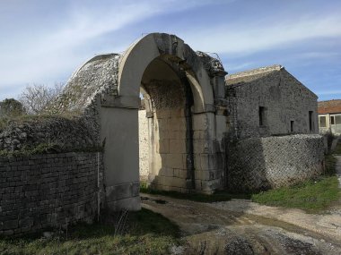 Altilia, Sepino - 8 March 2018: Porta Benevento, one of the accesses of the small Roman city of Samnite origins clipart