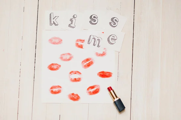 kiss me and red lip prints