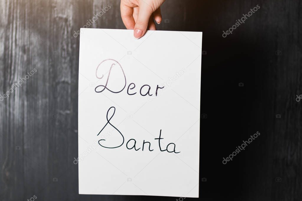 woman holding santa letter