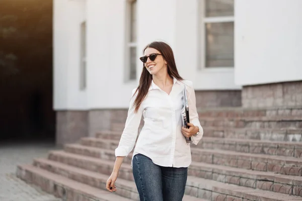 Portrait of One Fashionable Girl Dressed in Jeans and White Shirt Holding Laptop, Freelance Worker, Business Lady, Woman Power Concept — Stock Photo, Image