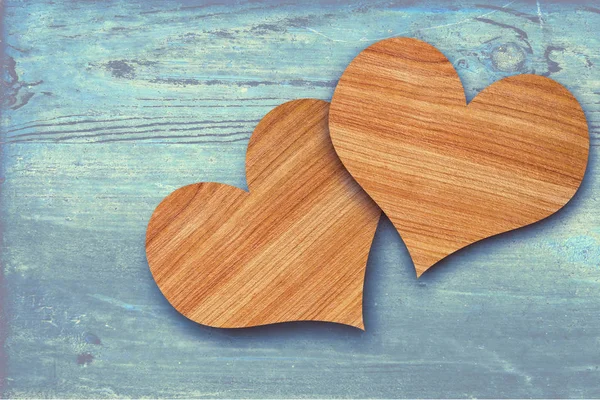 Dos corazones de madera — Foto de Stock