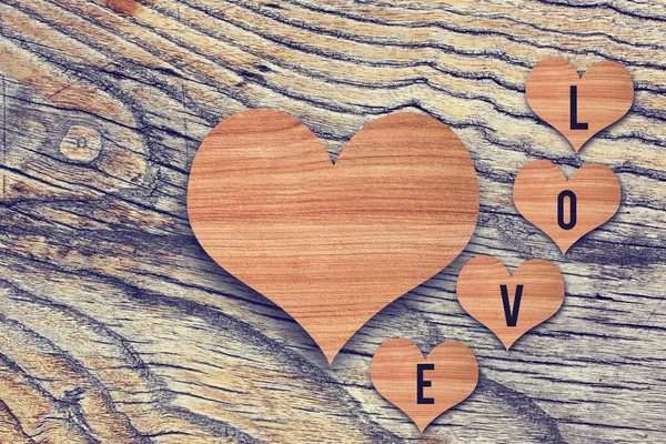 Wooden heart on wood background — Stock Photo, Image