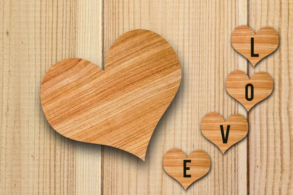 Wooden heart  on table — Stock Photo, Image