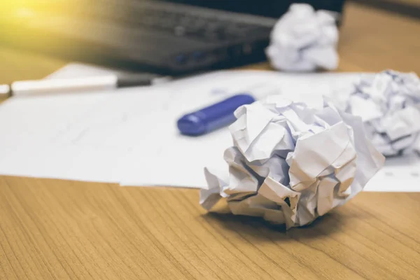 Crumpled paper on office table — Stock Photo, Image