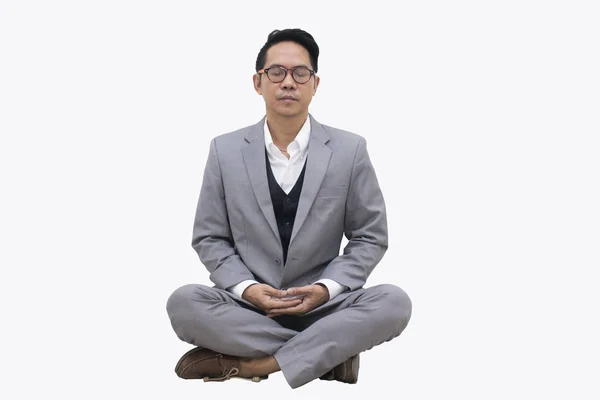 Biznesmen medytacja na białym tle — Zdjęcie stockowe