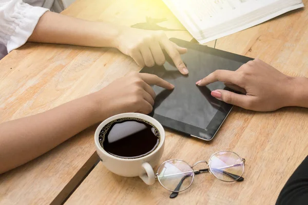 Group of friends having fun together with tablet