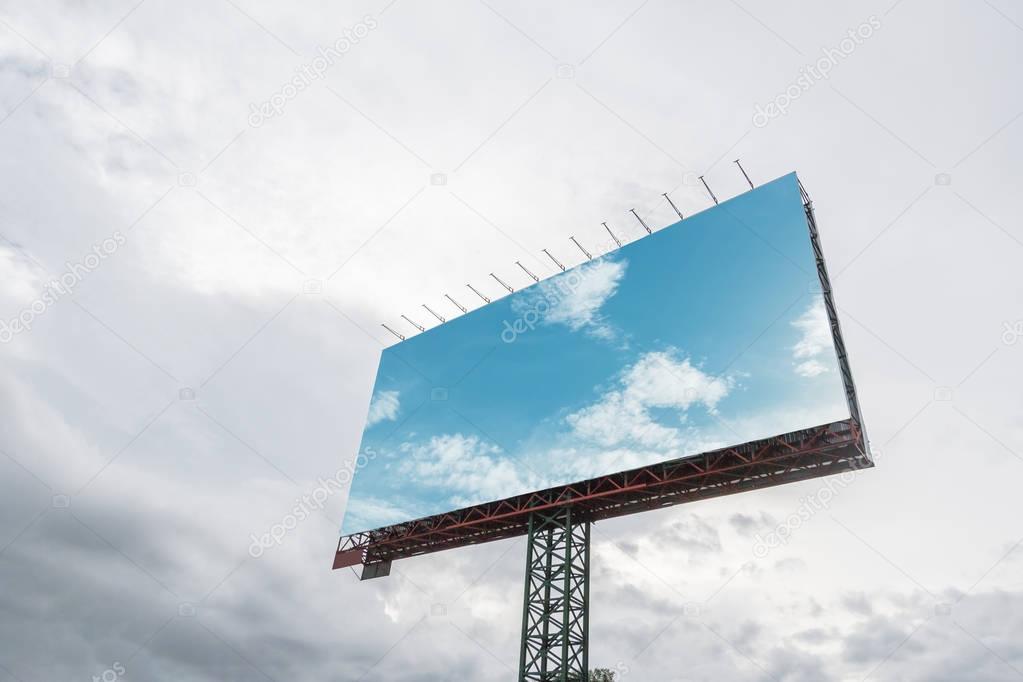 Blank billboard on sky