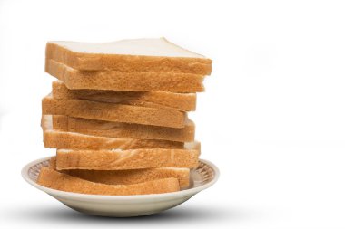 beyaz üzerine dilimlenmiş ekmek