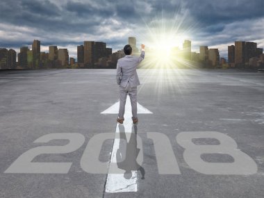 Ok ile ayakta işadamı