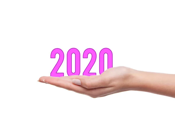 2020 rok numery w ręce kobiety na białym tle — Zdjęcie stockowe