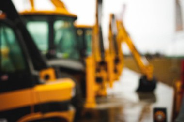 Ekskavatör yükleyici makine. Yan görünüm ön çapa Loader. Endüstriyel araç. Ağır ekipman makine. Pnömatik kamyon. İnşaat ekipmanları. arka plan bulanıklık