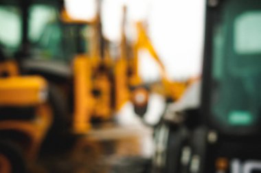 Ekskavatör yükleyici makine. Yan görünüm ön çapa Loader. Endüstriyel araç. Ağır ekipman makine. Pnömatik kamyon. İnşaat ekipmanları. arka plan bulanıklık