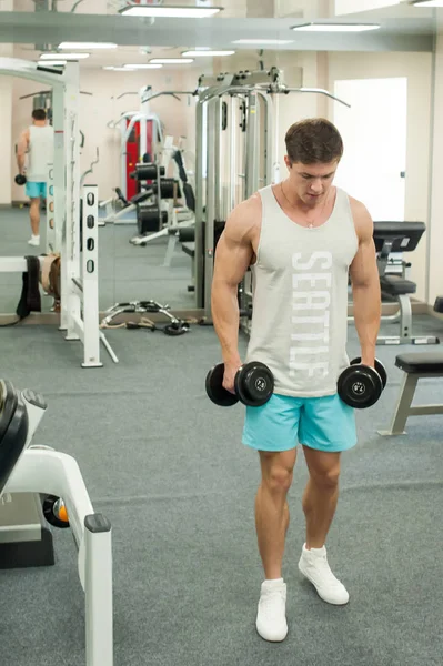 Young Sexy Male Bodybuilder Athlete Trains Gym Using Sports Equipment — Stock Photo, Image