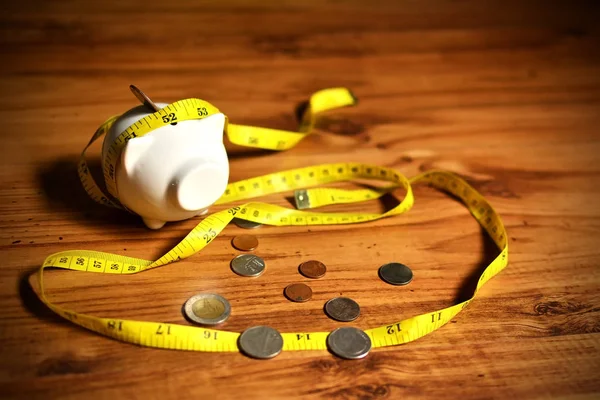 piggy bank with money on black background. Concept big dream