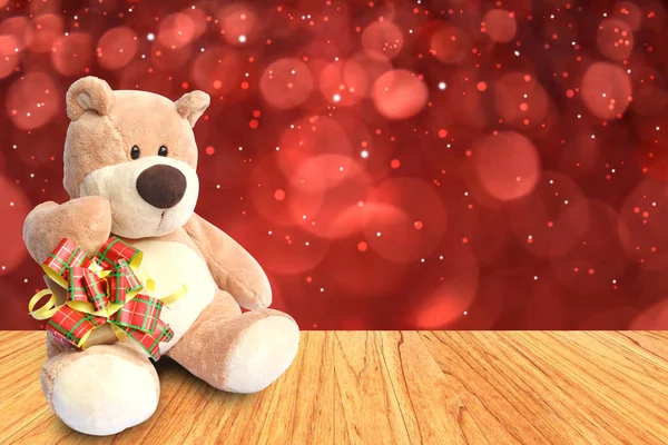 Close up teddy bear with box on christmas background — Stock Photo, Image