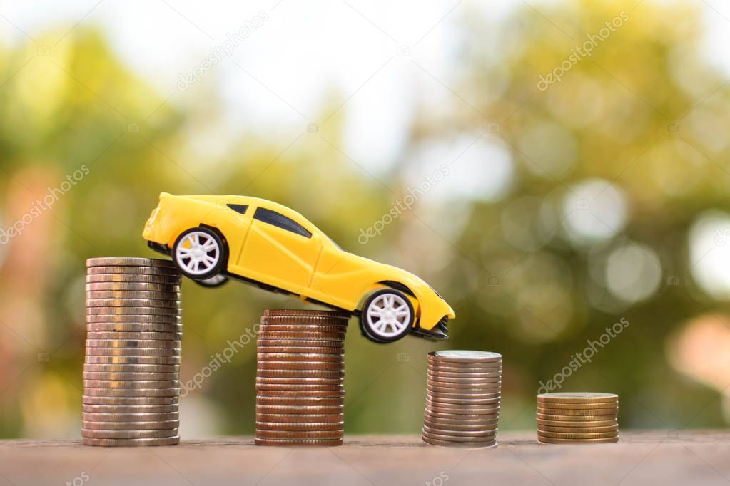 coin with car on old wood  