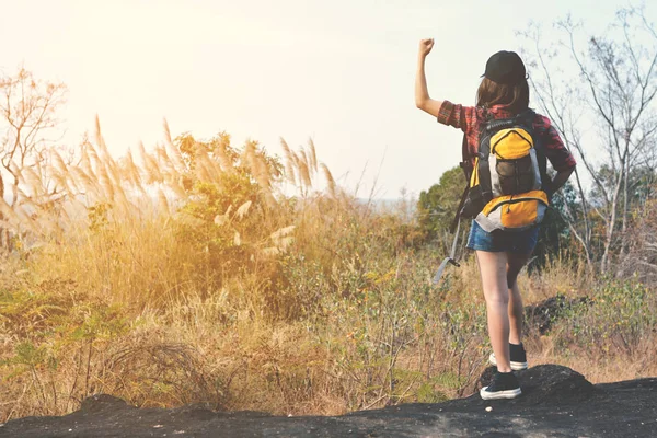 Happy Asian hipster women backpack in nature background — Stock Photo, Image