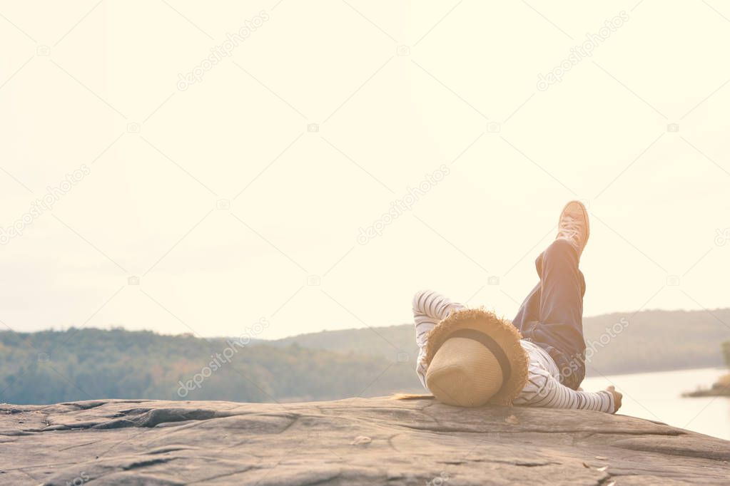 Happy Asian girl in nature background, Relax time on holiday 