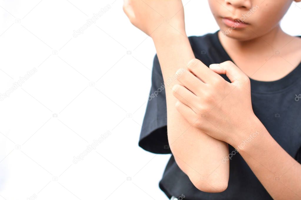 little Asian girl scratch itch hand on white background