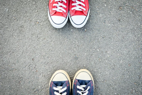 Sneakers on road background .hipster tone and selective focus — Stock Photo, Image