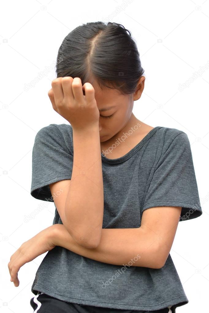 Sad little Asian girl on white background